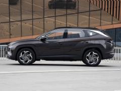 2021 Tucson L 1,5 т LUX Premium Edition 2021 Tucson L 1.5T LUX Premium Edition Фото 4 из 66